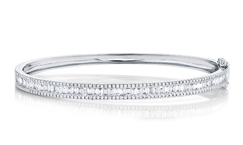 a white gold diamond bangle bracelet from Shy Creation.