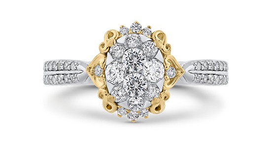 a mixed metal fashion ring featuring diamonds and an elaborate silhouette