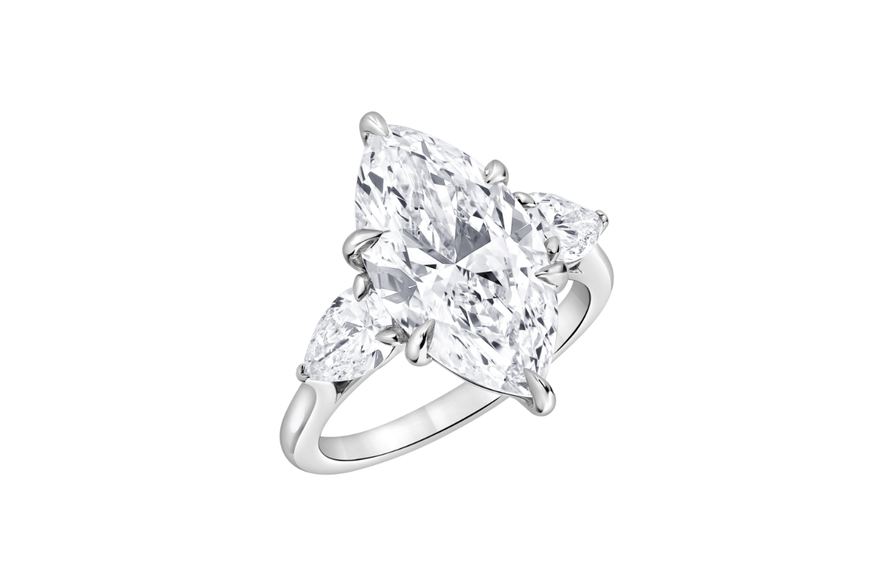 A three-stone marquise engagement ring in white gold.