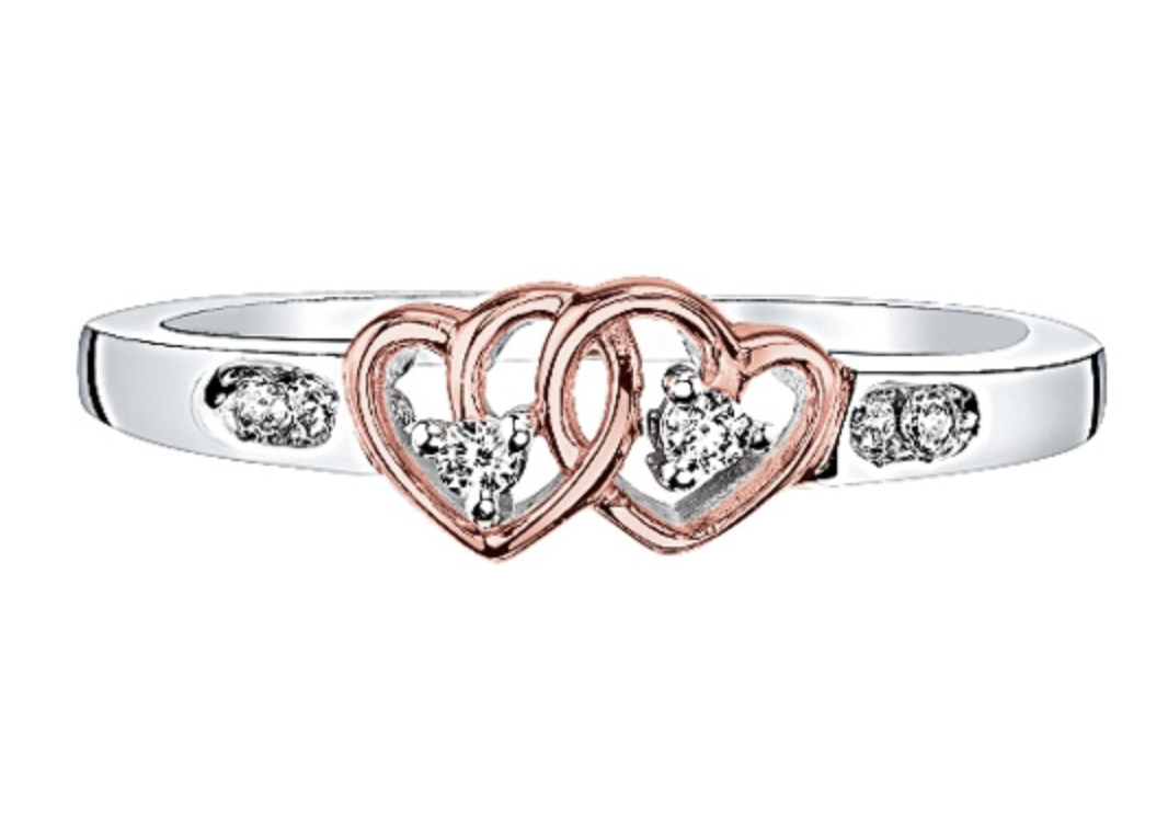 A two tone ring with two intertwined hearts and diamonds.