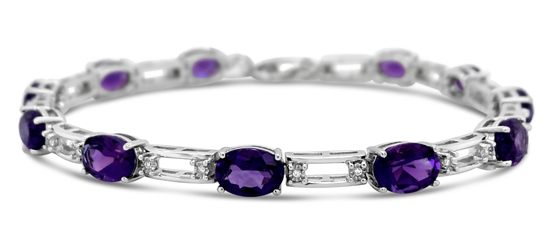 A sterling silver oval cut amethyst bracelet