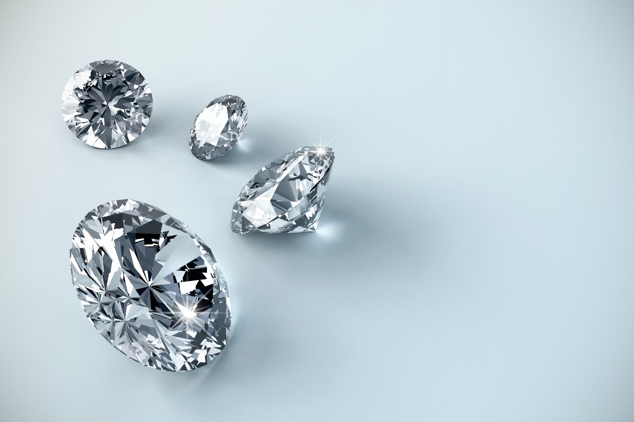 Two oval diamonds and two round diamonds Two oval diamonds and two round diamonds