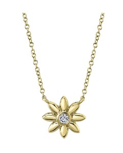 Gold flower pendant with a diamond for the middle of the flower