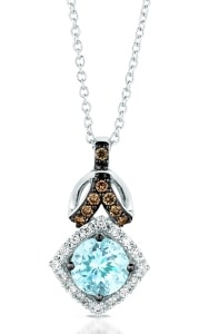 A Le Vian pendant features a round cut aquamarine stone with a chocolate diamond accent