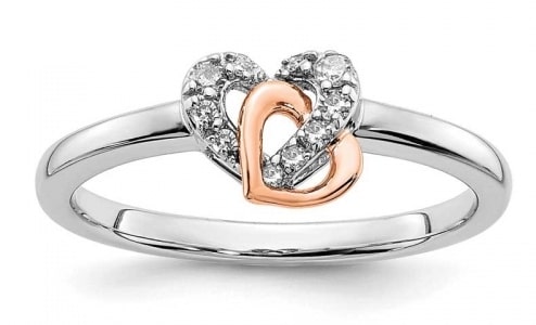 A Morgan Jewelers’ interlocking heart fashion ring features diamonds and mixed metals