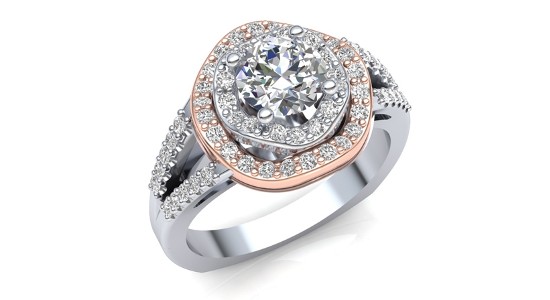 A silver engagement ring with a two-tiered halo, one of which is set in rose gold