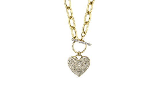 a yellow gold chain necklace with a heart-shaped, diamond-studded pendant