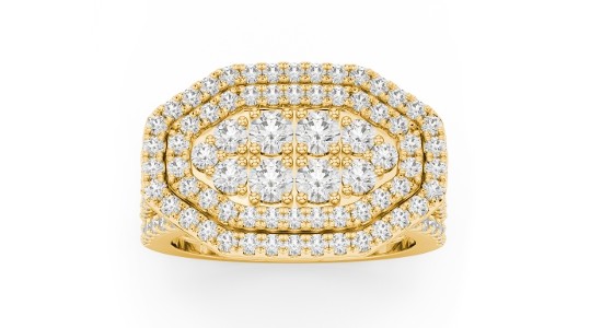 a big, bold yellow gold fashion ring covered in diamonds