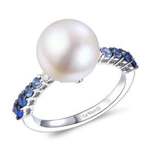 A pearl ring with blue gemstone accents along the shank, crafted in Le Vian’s vanilla gold.