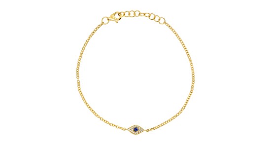 a yellow gold chain bracelet featuring an eye motif set with a sapphire and diamonds