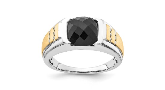 a mixed metal men’s wedding band featuring an onyx center stone and diamond accents