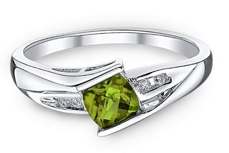 A peridot and diamond fashion ring set in sterling silver.