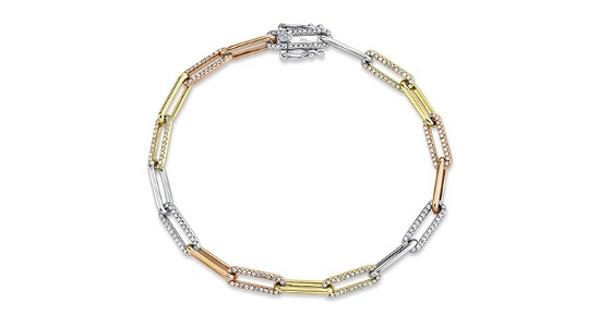 a mixed metal chain link bracelet featuring diamond accents