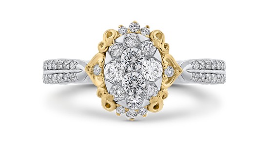 a mixed metal fashion ring featuring diamonds and an elaborate silhouette