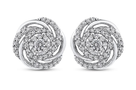 a pair of diamond stud earrings from Shah Luxury.