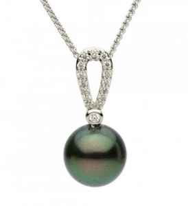 A Tahitian pearl pendant crafted in white gold and diamond accents.